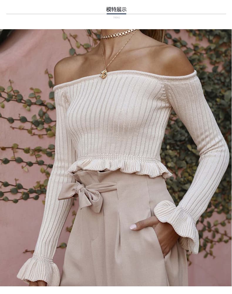 Ivory Bardot ribbed peplum knit top with flared cuffs