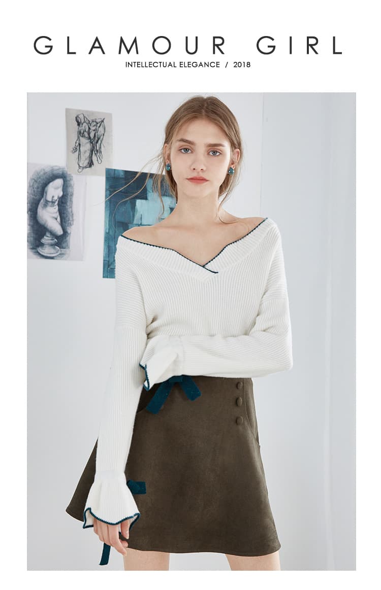 Ivory contrast-edge off-shoulder knit top with bow detail