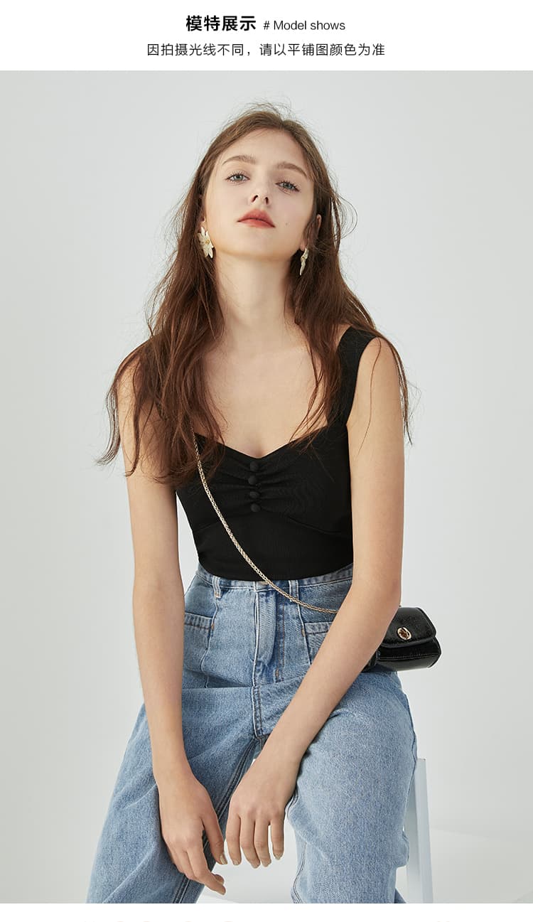 Black button-front knit camisole styled with denim pants
