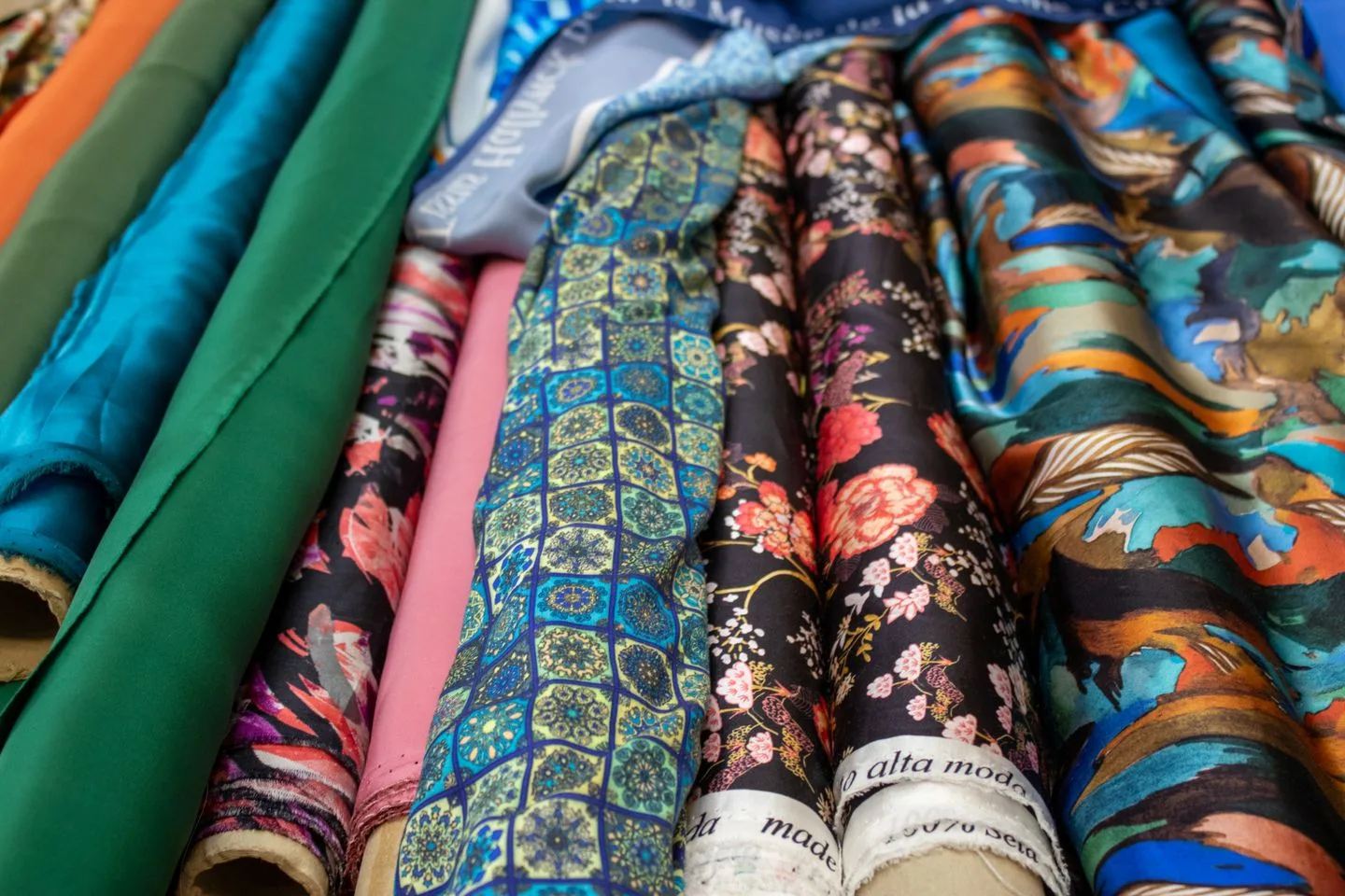 Patterned fashion fabric rolls selected from supplied print-fabric source material