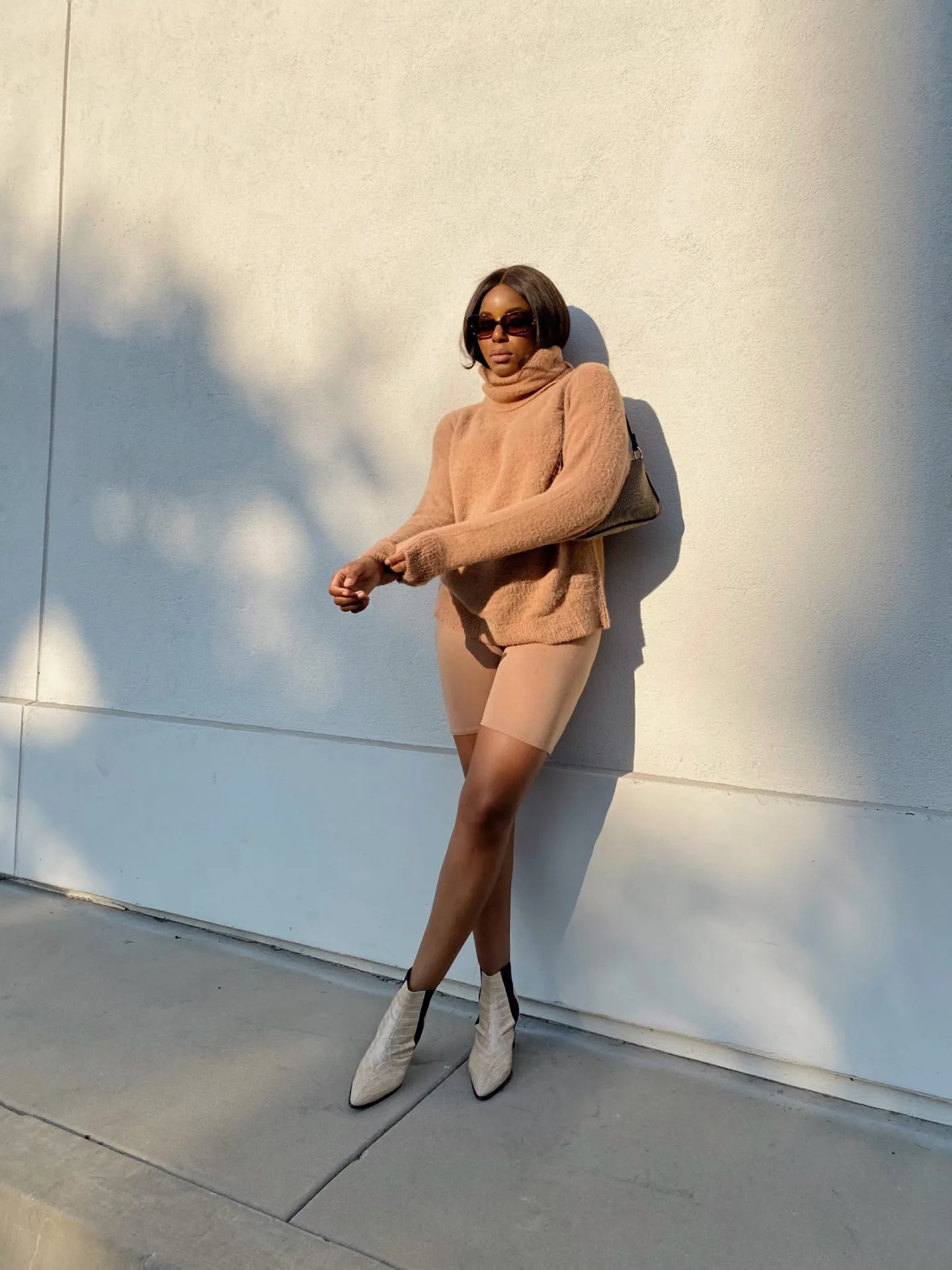 Beige knitwear set used as a neutral color palette reference for apparel collection development