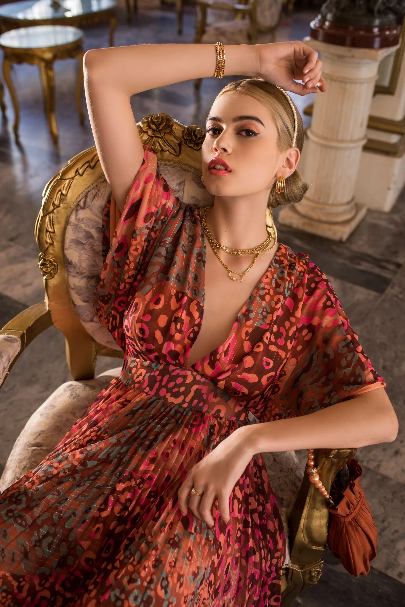 Printed wrap dress with gathered waist and pleated skirt used as a private-label dress development reference