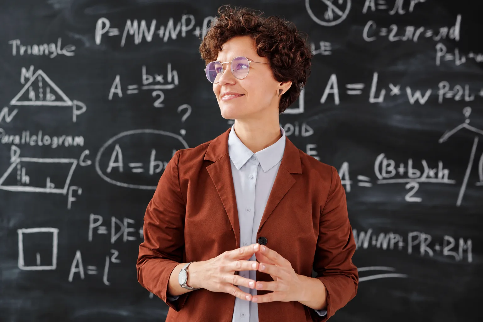 Rust-colored tailored blazer used as a rich rust fashion color-development reference