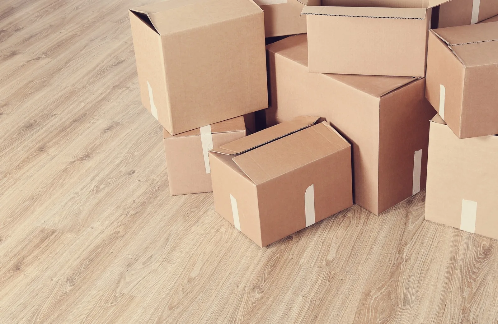 Separate cardboard shipping cartons illustrating the need to assign each market and SKU assortment to the correct outer package