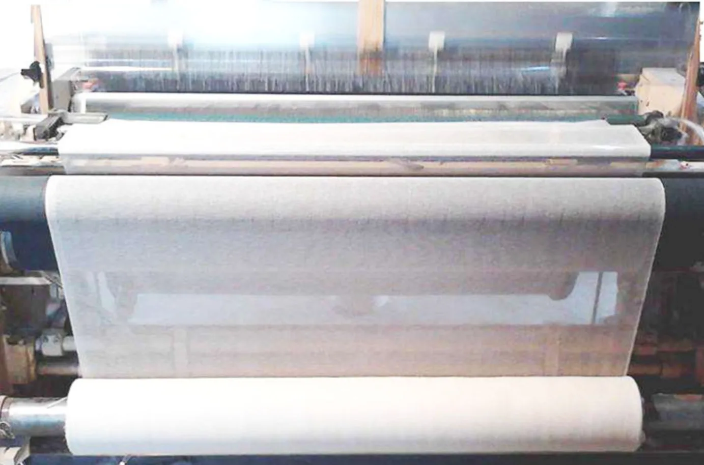 Specialist fabric coating line at a Yinshan Fashion partner fabric factory